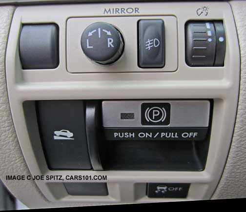 subaru legacy and outback driver controls with optional fog lights