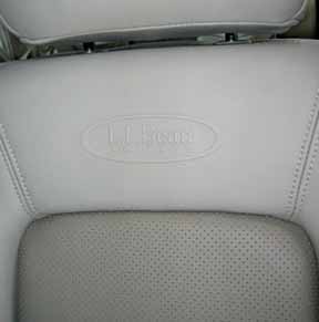 Subaru LL Bean Beige and mocha perforated leather and logo
