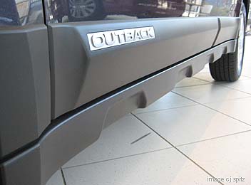 close-up of lower body cladding on 2010 Outback