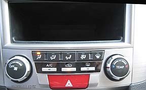 2010 Outback 2.5i heated control with storage (no door)