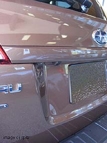2011 Outback without rear gate garnish- caramel bronze shown