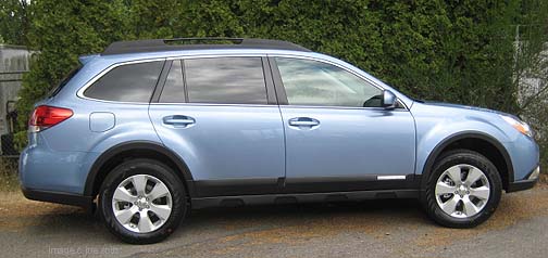 2011 sky blue subaru outback with optional wheel arch moldings