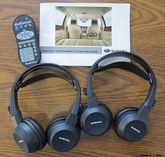 outback factory DVd comes with 2 wireless headphones, remote control, 4 AV and aux plugs, instruction manual