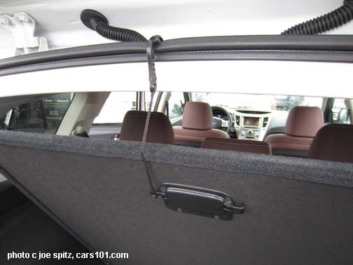 subaru outback cargo floor hook holds the floor up to access the storage trqay and spare tire