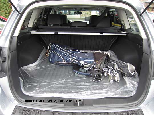 2013, 2012, 2011, 2010 subaru outback cargo area shown with a set of golf clubs