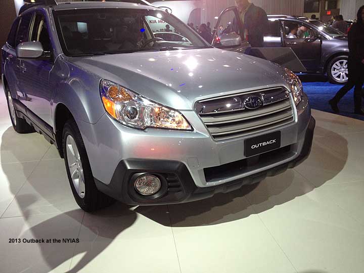 2013 outback front end with new grill, fog lights and bumpers