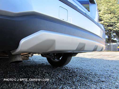 closeup of optional rear bumper underguard on 2013 subaru outback, ice silver shown