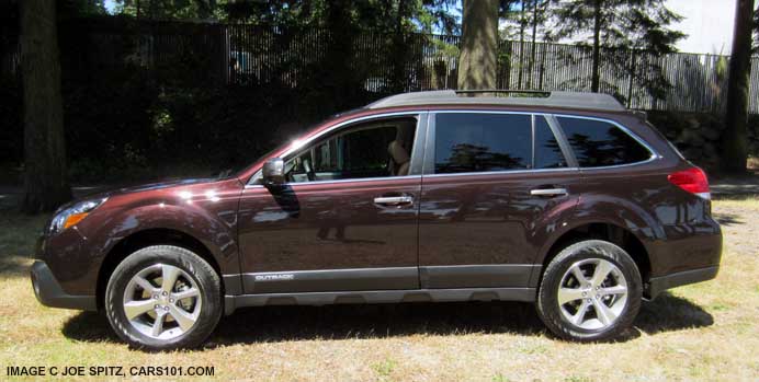 brilliant brown subaru outback limited, side view
