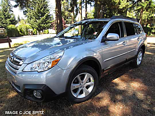 ice silver 2014 subaru outback with body side moldings, wheel arch moldings