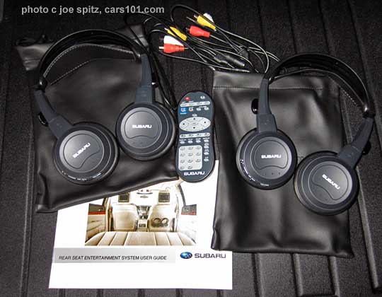 subaru outback rear seat dvd players come with 2 headphone, cables, remote control, storage bags