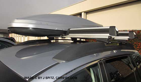aftermarket roof rack crossbars with cargo box and ski attachment on a 2014, 2013 Outback