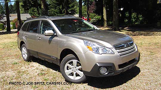 tungsten metallic subaru premium shown on a sunny day- the metallic beige color comes out in the sun