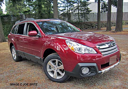 side view 2014 venetian red subaru outback with body side moldings