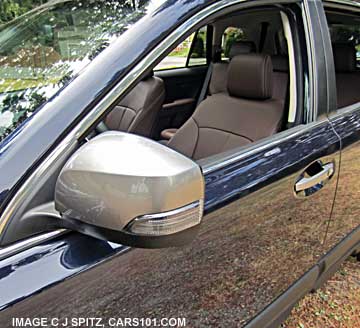 2014 subaru outback limited special appearance package with silver outisde mirrors. deep indigo color shown