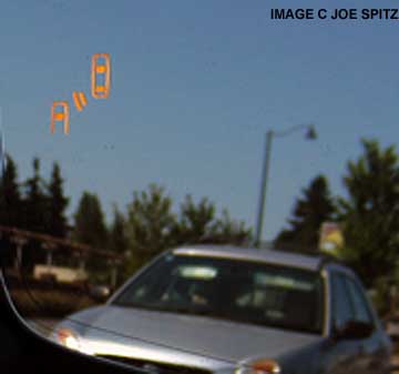 close-up of the Outback's blind spot detection warning symbols