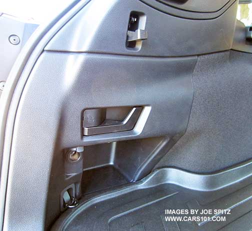 Outback left rear corner with seat fold lever, grocery hook, 12v power outlet, cargo hook