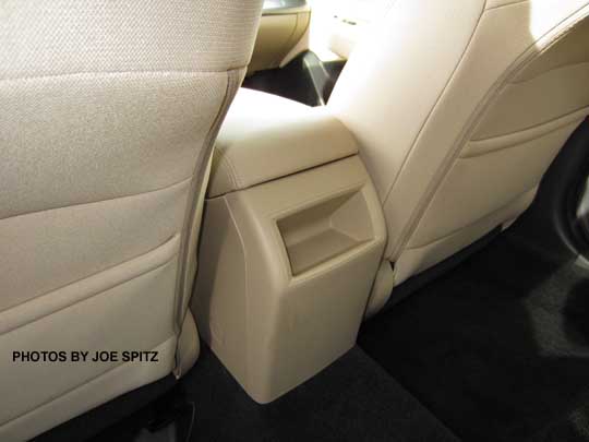 rear of center console 2015 Outback. warm ivory beige