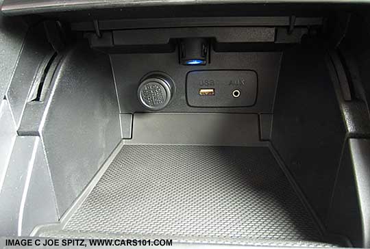 Outback 2.5i front console storage with ambient light, 12v outlet, single USB, single aux jack