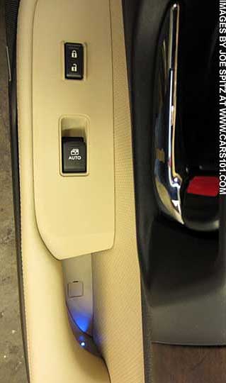 Subaru Outback blue LED illuminated door handle, Limited model, warm ivory shown