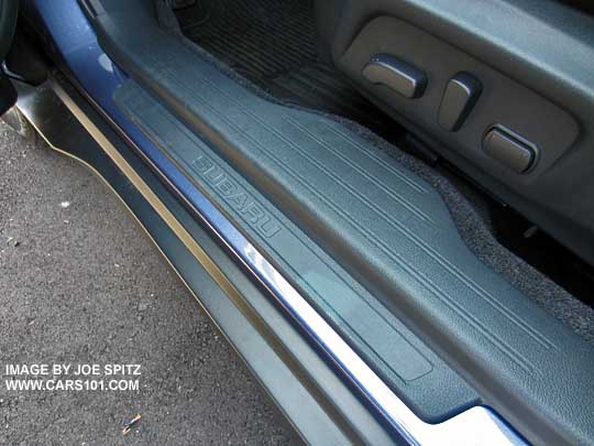Outback 2.5i and Premium has Subaru embossed  plastic front door sill plates