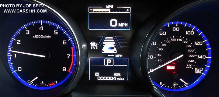 2015 Outback dash instrument panel gauges, shown with Eyesight active cruise control center display. 3.6L 6 cylinder model.