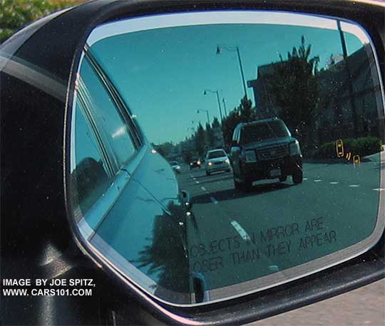 optional auto dimming outside mirror and approach light with blind spot detection