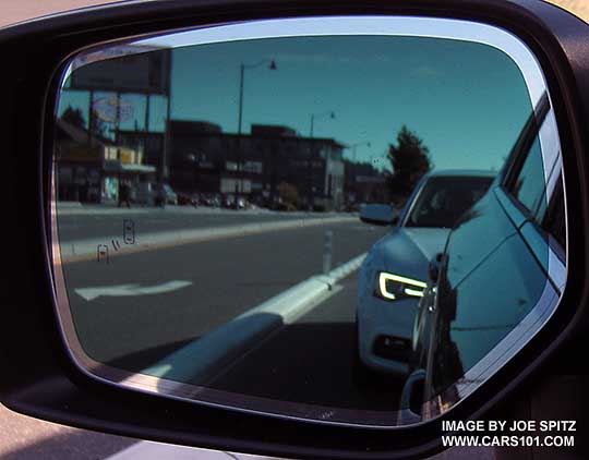 dimming outside mirror, optional on all 2015 Outbacks. Shwon with Blind Spot Detection