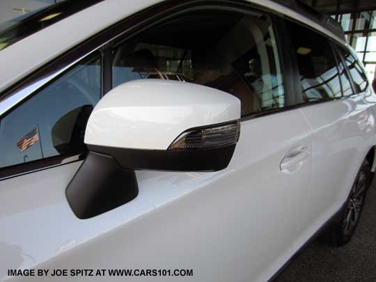 white Outback Limited, and Premium with Eyesight, have body colored painted outside mirrors with integrated turn signals