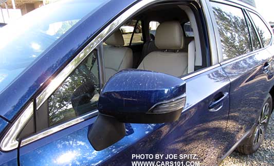 outback limited turn signal mirror. lapis blue color