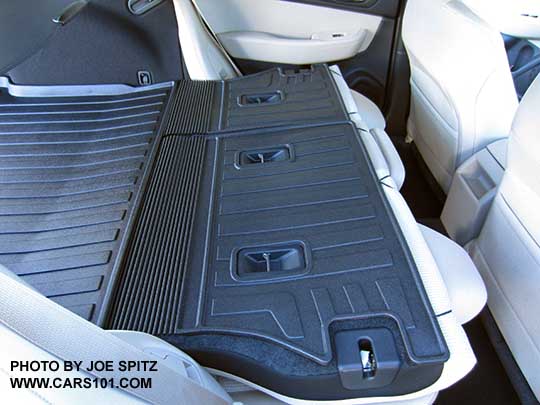 2015 Outback's  redesigned optional rear seatback protector uses velcro, no grommets to break off
