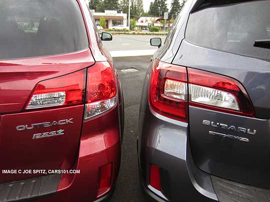 side by side Outback tail lights, 2014 on left (red), 2015 on right (gray)