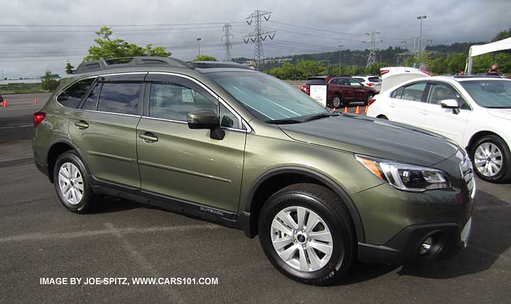 2015 wilderness green subaru outback with optional side moldings, wheel arch moldings