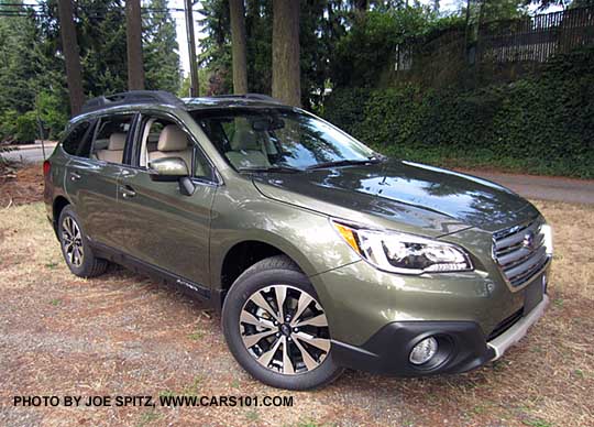 side view 2015 Outback Limited has front under spoiler, wilderness green shown