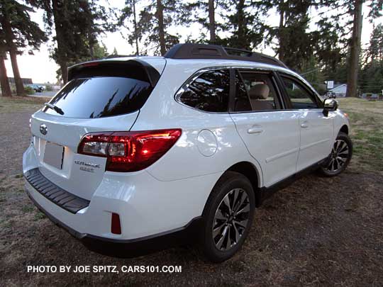 rear view, crystal white 15 Outback Limited with side moldings