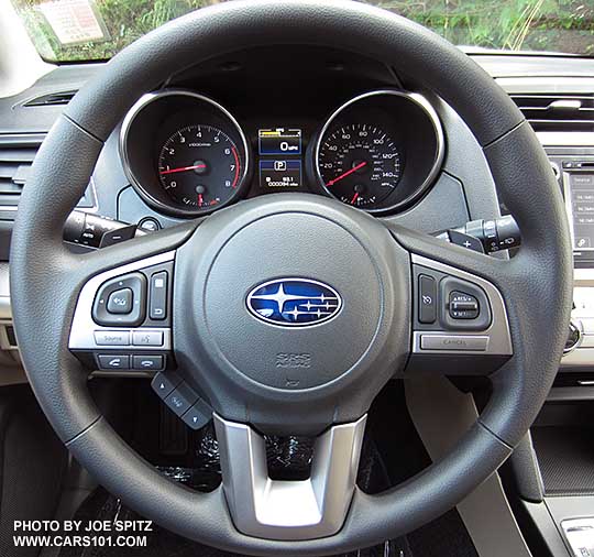 2015 Outback 2.5i vinyl srapped steering wheel, audio, bluetooth, and center dash info display controls. Tilt and telescoping