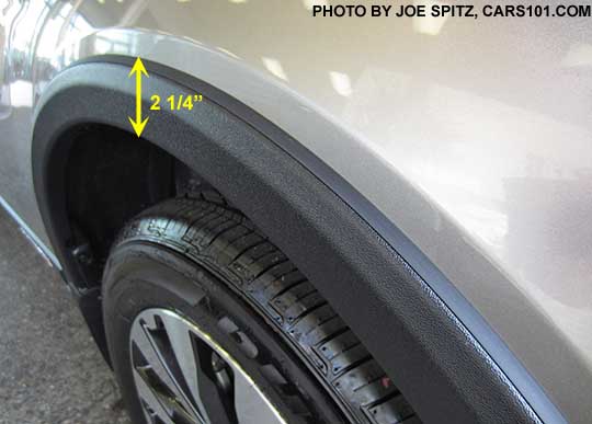 2015 Outback optional wheel arch moldings are 2 1/4". they're smaller than previous years and don't fully cover the wheel arch area.