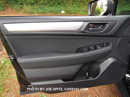 2016 Subaru Outback  drivers door panel. 2.5i base model with silver trim, black inside door handle, off black cloth