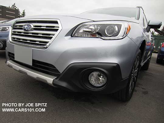 2016 Subaru Outback 2.5i Limited has fog lights and silver front bumper underguard. Ice silver shown.