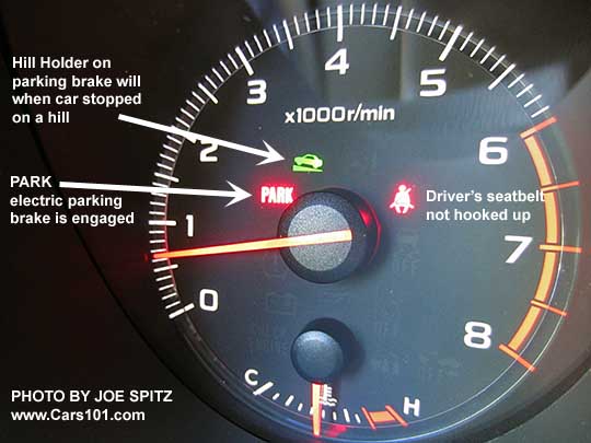 diagrammed 2016 Subaru Outback tachometer showing parking brake engaged light and hill holder light