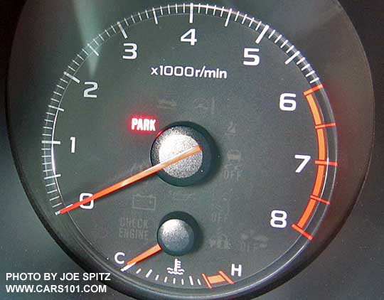 2016 Subaru Outback tachometer showing parking brake engaged light. Notice lower temperature gauge