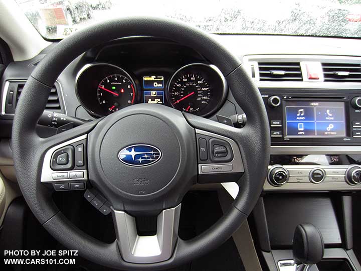 2016 Subaru Outback 2.5i base model vinyl wrapped steering wheel, standard dashboard gauges, 6.2" audio screen
