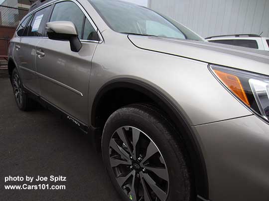 2016 Subaru Outback optional wheel arch molding. Limited shown with 18" alloy wheels. Ice silver.