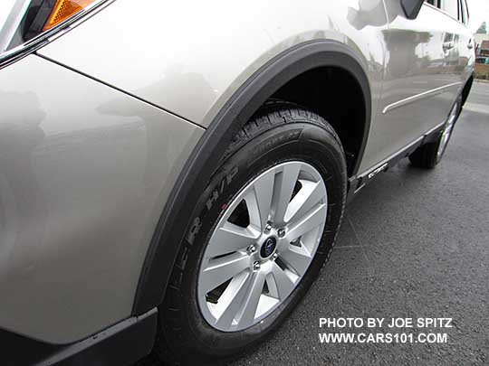 2016 Subaru Outback with optional wheel arch moldings.  Limited model shown with 18" alloy wheels.