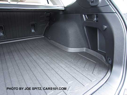 2017 Subaru Outback rear cargo area, right passenger side shown with storage bin