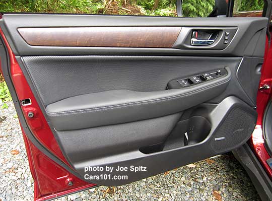 2017 Outback Limited driver's door panel. Perforated gray leatherette, woodgrain trim, memory seat buttons