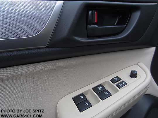 2017 Outback 2.5i base model textured silver door and dash trim, black inner door handle (all other models are chrome), warm ivory cloth shown.