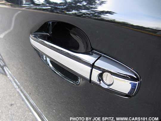 crystal black 2017 Subaru Outback Touring  body colored outside door handle with chrome trim strip. Driver's door shown with key lock