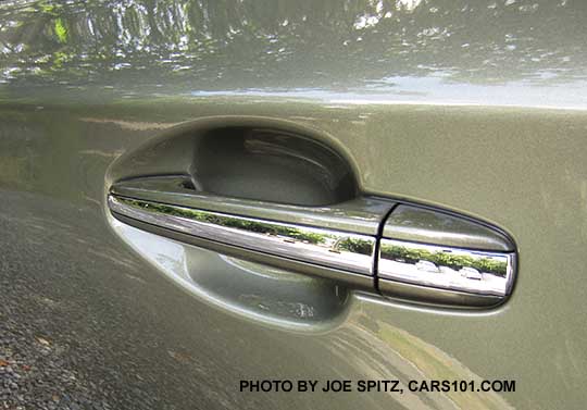 2017 Subaru Outback Touring outside door handles have chrome center accent strip and the front door handles have a keyless access lock hotspot (rub to lock all doors). Wilderness green Touring shown