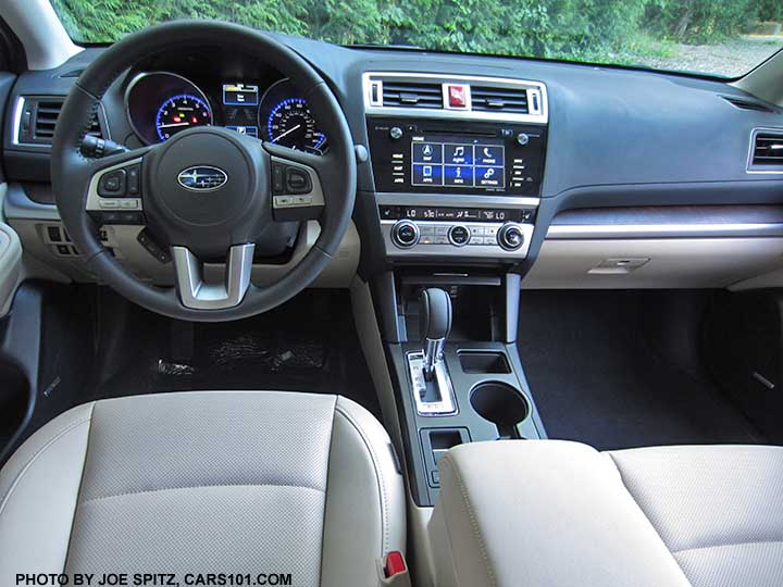 interior view 2017 Subaru Outback Limited interior with warm ivory perforated leather, woodgrained dash trim