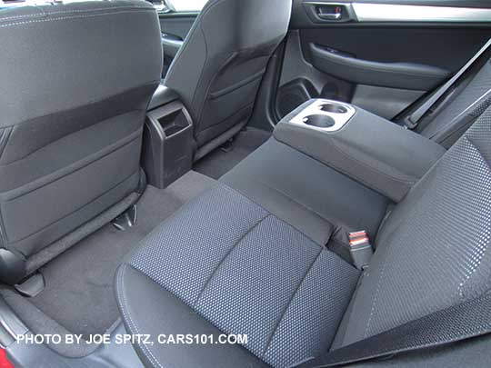 2017 Subaru Outback Premium rear seat with the center armrest, slate black cloth interior, with textured silver dash trim